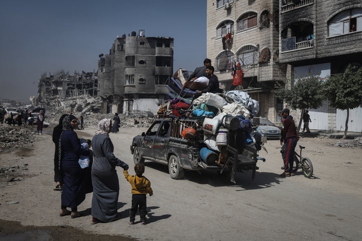 Palestinian residents from the areas of Beit Lahiya, Jibaliya, Tel al-Zaatar, and Tel al-Sultan in the Gaza Strip flee towards locations they perceive as safer following intensified Israeli military attacks in Gaza Strip on May 16, 2025. (Photo by Khames Alrefi/Anadolu via Getty Images)