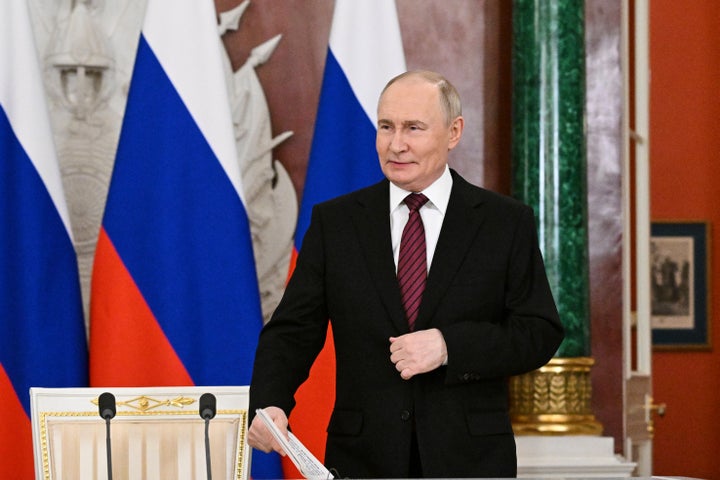 Russian President Vladimir Putin gestures as he speaks to journalists in the Grand Palace at the Kremlin in Moscow, Russia, Sunday, May 11, 2025 (Sergei Bobylev/Photo host agency RIA Novosti via AP)