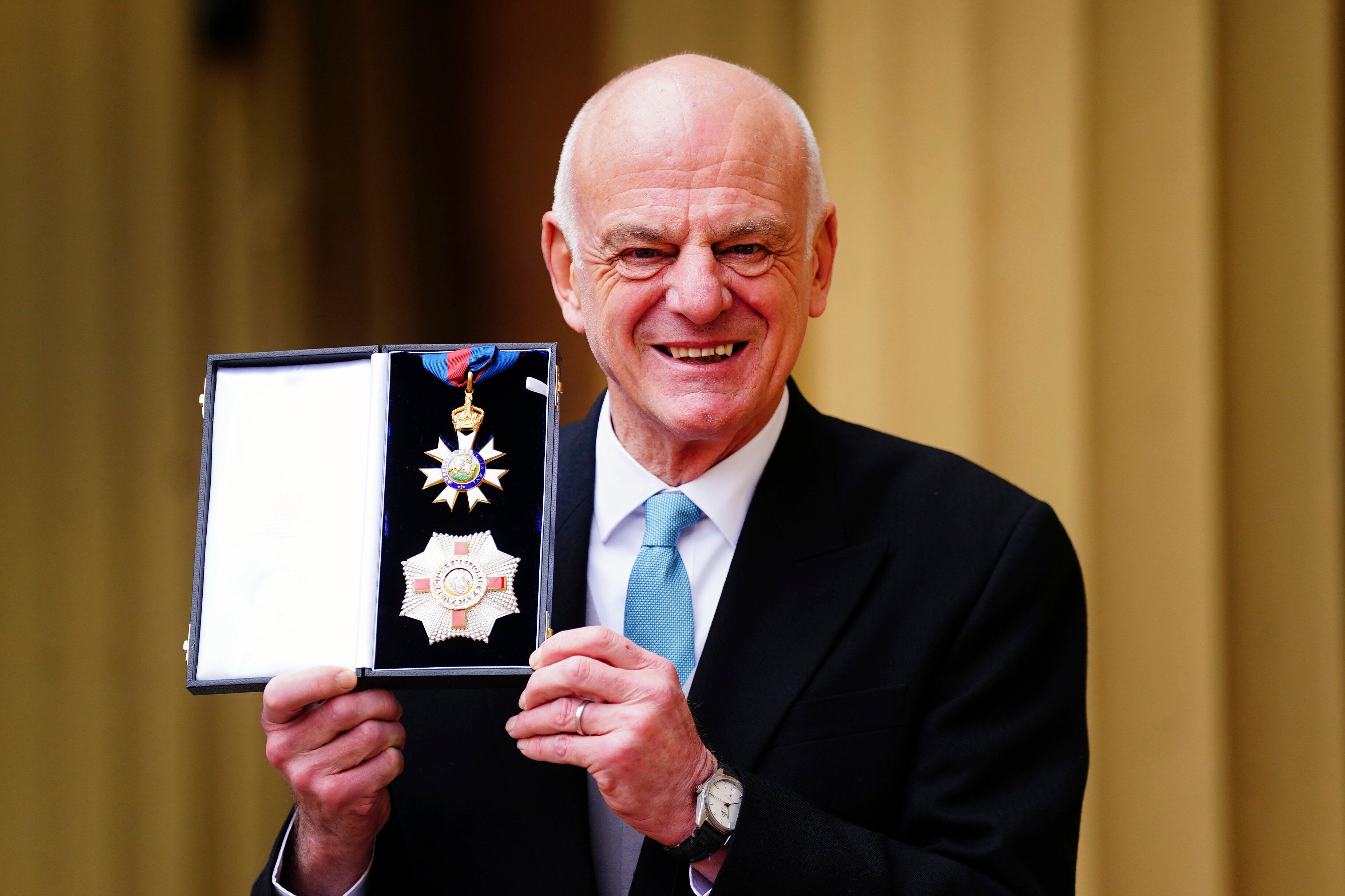 David Nabarro, World Health Organisation Special Envoy for Covid-19 Prevention and Response, poses after he was made a Knight Commander of the Order of St Michael and St George during an investiture ceremony at Buckingham Palace in London, Friday March 3, 2023. (Victoria Jones/Pool via AP, file)