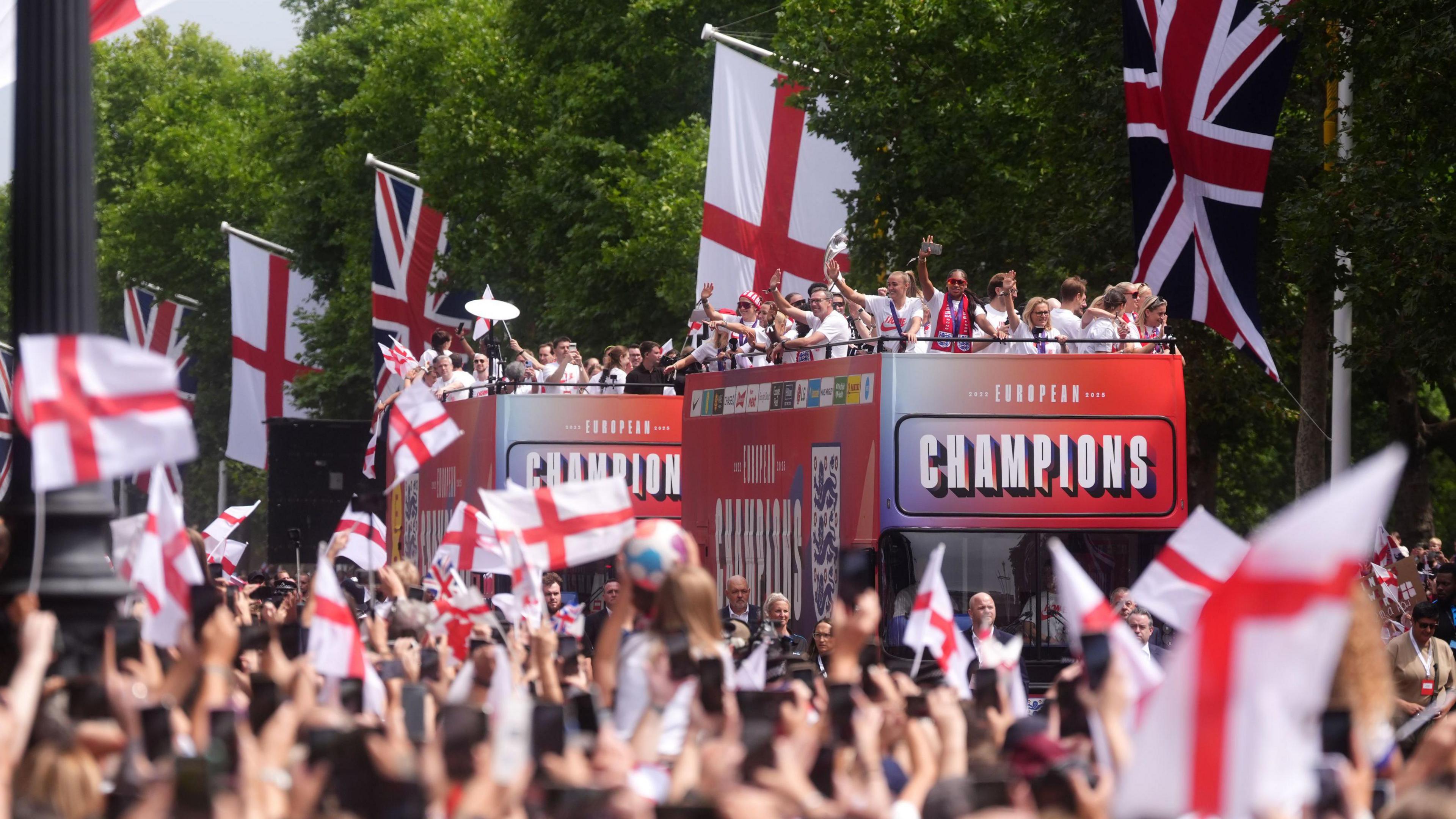 England women's squad on an open-top parade on The Mall after winning Euro 2025