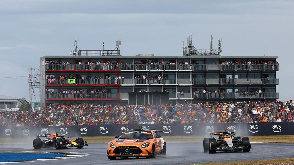 Oscar Piastri and Max Verstappen behind the safety car at the British Grand Prix