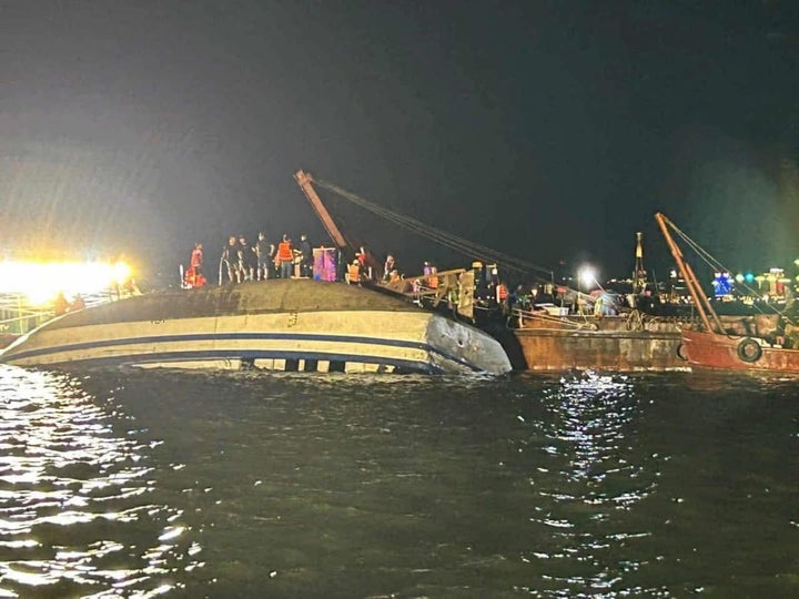 Emergency services attend to a capsized tourist boat in Halong Bay, Quang Ninh Province, Vietnam, on July 19, 2025. (Photo by Vietnam's Traffic Police Department / Handout/Anadolu via Getty Images)