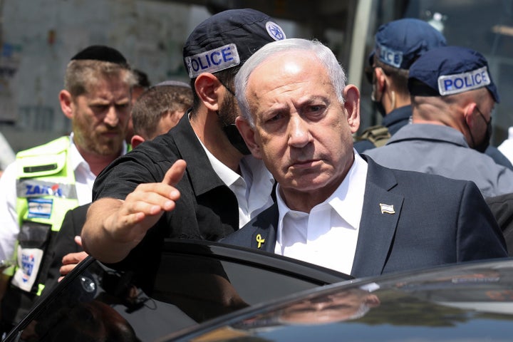 Israel's Prime Minister Benjamin Netanyahu visits the site of a shooting attack at a bus stop in Jerusalem, on Sept. 8, 2025.