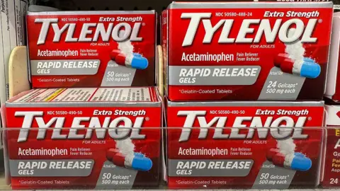 Getty Images Packages of 50 500mg Tylenol tablets on display on the shelf at a pharmacy in California, USA, on 22 September 2025. The packaging reads: "Tylenol extra strength acetaminophen rapid release gels for pain relief and fever reduction". 