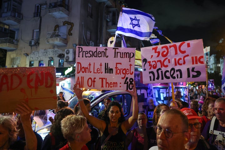 Demonstrators at an anti-government protest call for a ceasefire and for action to secure the remaining Israeli hostages in Gaza, in front of the Likud Party building in Tel Aviv, on Sept. 30, 2025.