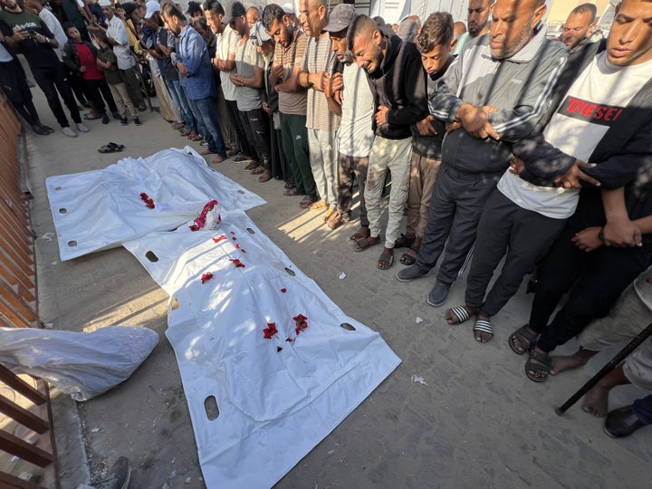 Palestinians mourn outside Nasser Hospital after an Israeli airstrike targeted tents sheltering displaced families in Al-Mawasi, killing and injuring several people on Sept. 30, 2025, in Khan Younis, Gaza.