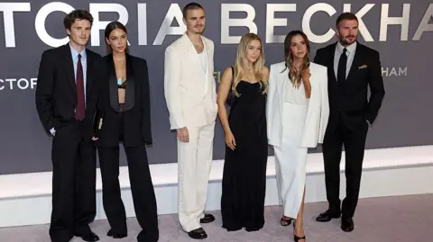Getty Images LONDON, ENGLAND - OCTOBER 08: Cruz Beckham, Jackie Apostel, Romeo Beckham, Harper Beckham, Victoria Beckham and David Beckham attend the "Victoria Beckham" World Premiere at the Curzon Mayfair on October 08, 2025 in London, England. (Photo by Neil Mockford/FilmMagic) 