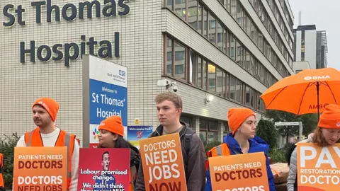 BBC News Dr Arthur Joustra, resident doctor, along with colleagues on the picket line outside St Thomas’s Hospital in central London. 