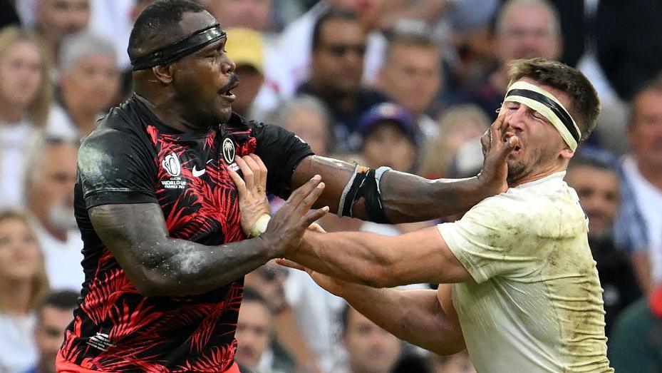 Levani Botia and Tom Curry clash