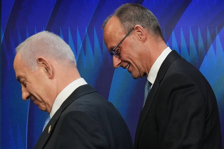 Israeli Prime Minister Benjamin Netanyahu (L) and German Chancellor Friedrich Merz depart after a joint press conference in Jerusalem on Dec. 7, 2025.