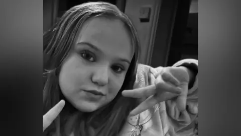 Sonia Hopkin A black and white image of Tiegan Jarman