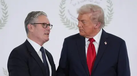 Getty Images Britain's Prime Minister Keir Starmer and President Donald Trump during a summit of European and Middle Eastern leaders on Gaza on October 13, 2025 in Sharm El-Sheikh, Egypt.