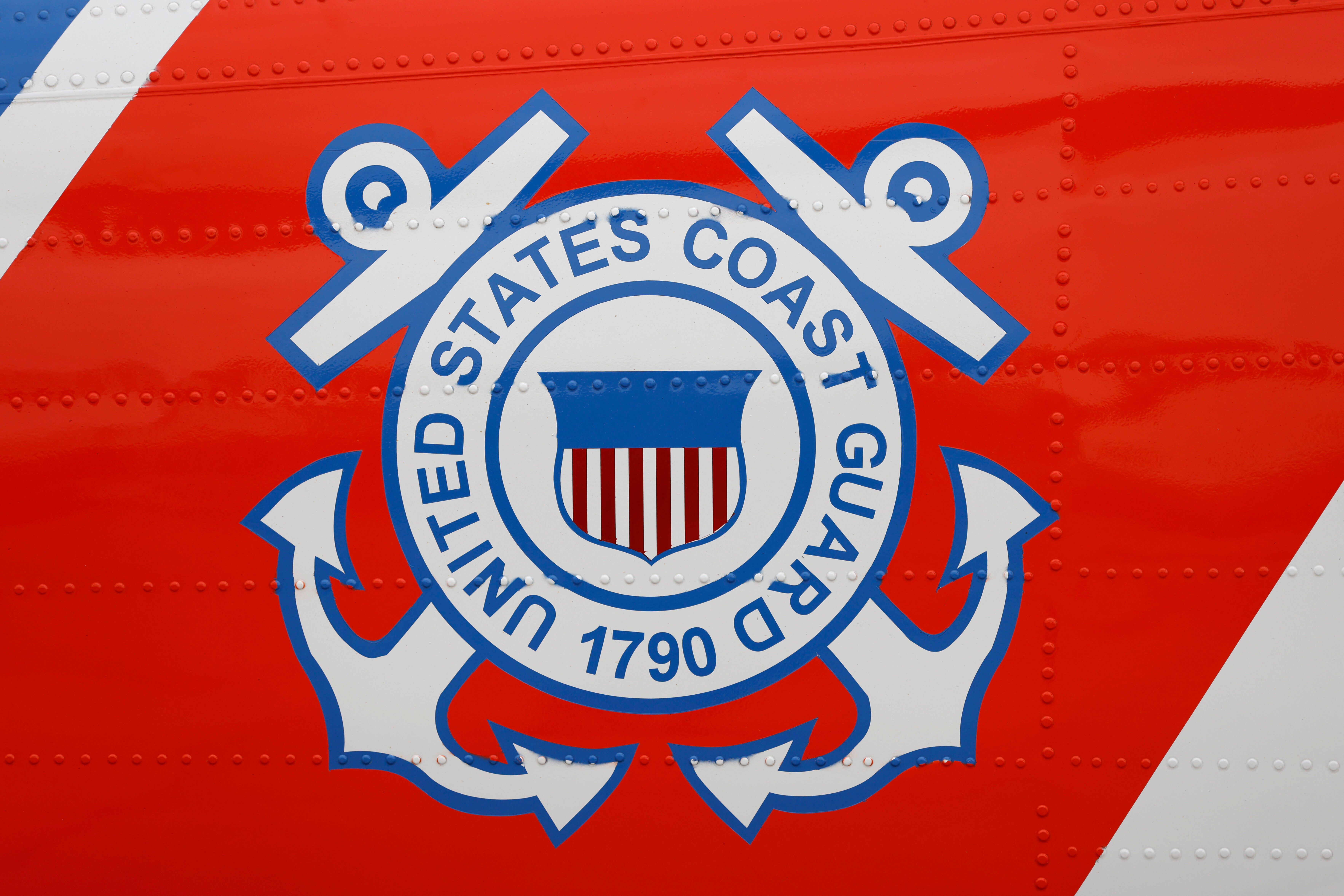 A U.S. Coast Guard logo is displayed on the side of their helicopter on September 26, 2025 in San Diego, California. (Photo by Kevin Carter/Getty Images)
