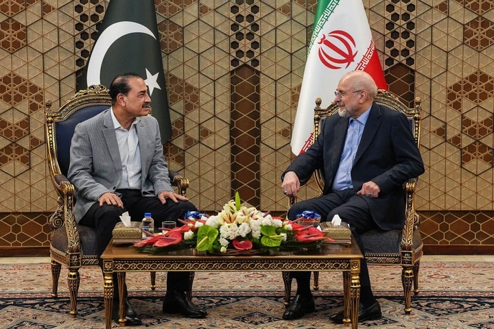 Pakistan's Chief of Army Staff Asim Munir (L) meets with Iranian Parliament Speaker Mohammad Bagher Ghalibaf (R), who heads the Iranian delegation in negotiations with the US, in Tehran, Iran on May 23, 2026. (Photo by Iranian Parliament Speaker Office / Handout/Anadolu via Getty Images)