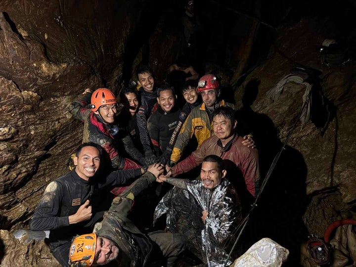 In this handout image provided by the Metta Tham Kalasin Rescue Unit, specialist divers work to rescue a group of seven Lao nationals trapped in a cave on May 29, 2026 in Xaisomboun, Laos.