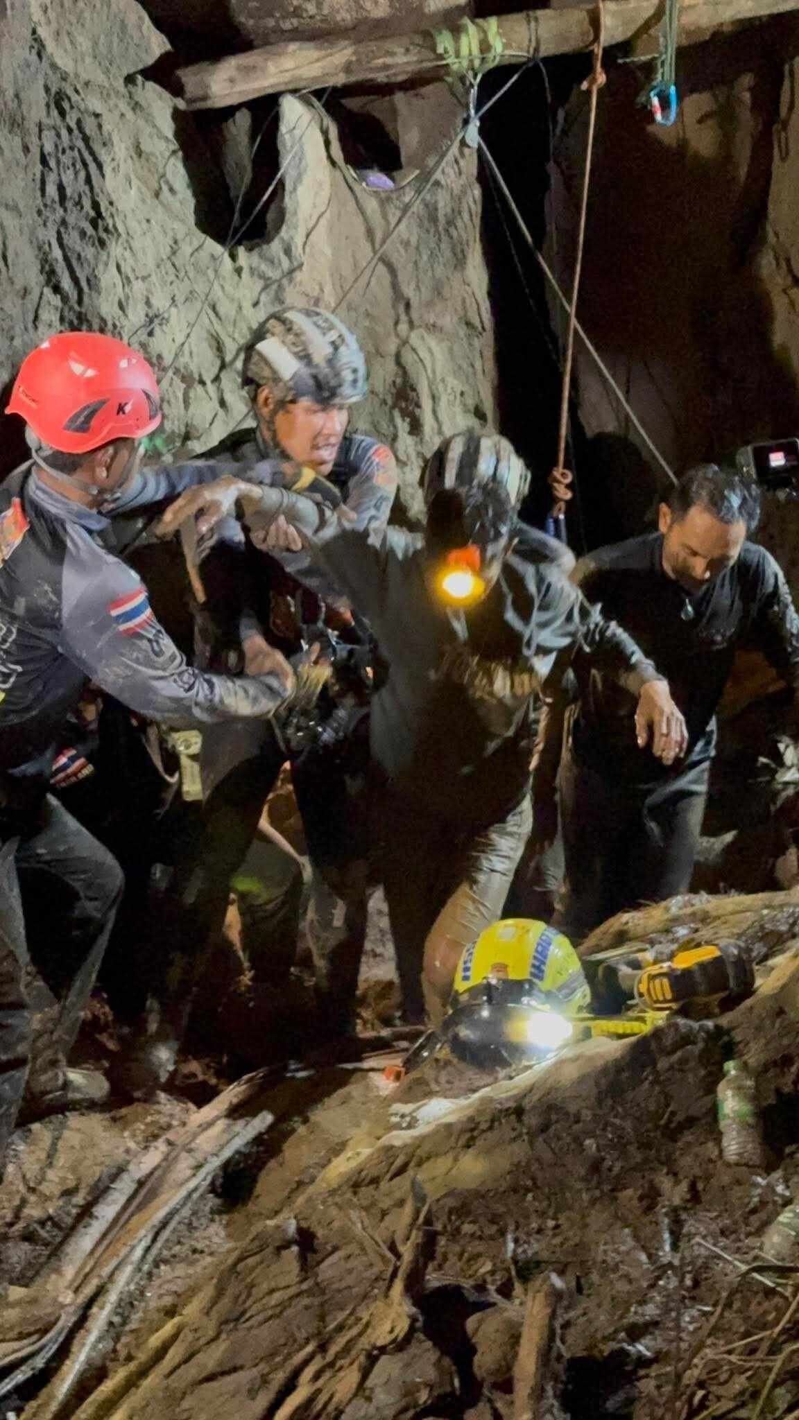 In this handout image provided by the Metta Tham Kalasin Rescue Unit, specialist divers work to rescue a group of seven Lao nationals trapped in a cave on May 29, 2026 in Xaisomboun, Laos.
