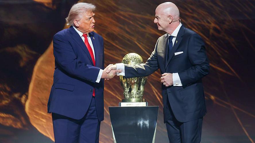FIFA president Gianni Infantino and US President Donald Trump shake hands during the World Cup's official draw