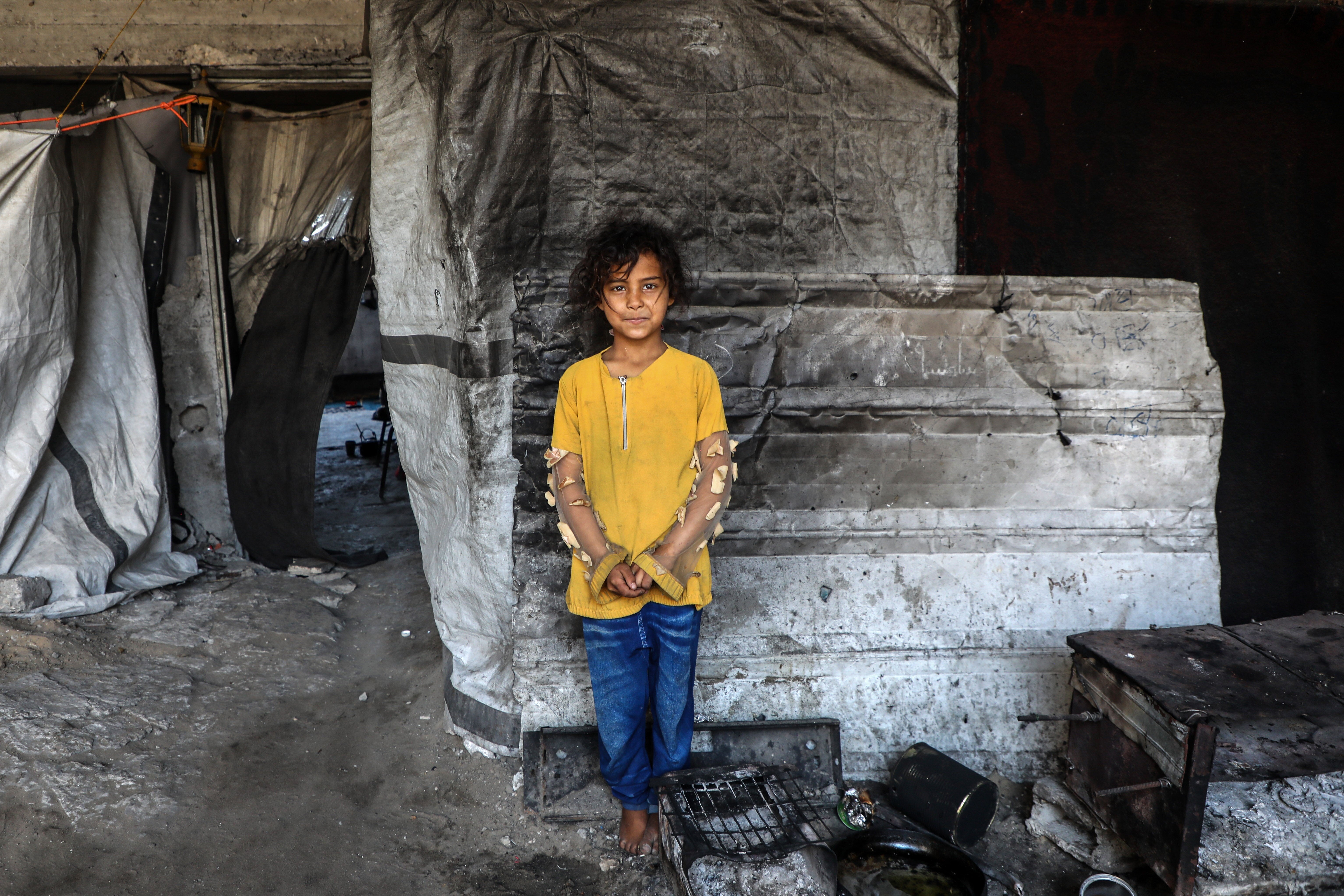 This photo taken on June 18, 2026 shows a girl from Beit Hanoun in the northern Gaza Strip, who is displaced and sheltering in a building in Gaza City. (Photo by Rizek Abdeljawad/Xinhua via Getty Images)
