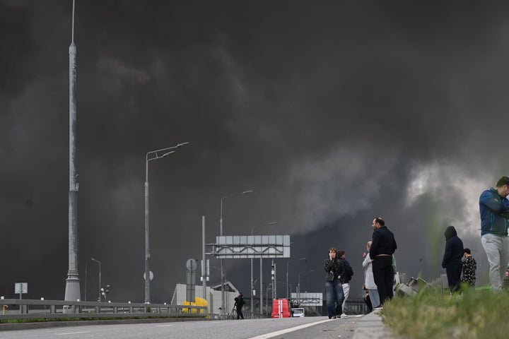 Black smoke billows from the area of Gazprom Neft's Moscow oil refinery, located on the southeastern outskirts of Moscow, on June 18, 2026, following what the Russian capital's mayor described as a "large-scale" drone attack by Ukraine. Moscow came under one of the largest Ukrainian drone attacks since the start of the war, with an oil refinery struck and around 200 drones intercepted on their approach to the Russian capital, Mayor Sergey Sobyanin said Thursday.