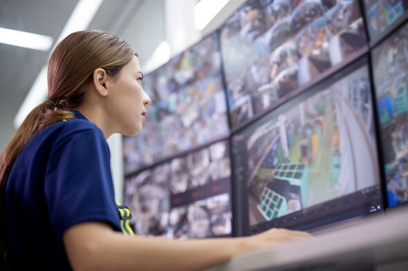 Real-time Monitoring of Video Surveillance Cameras to Increased Sense of Security in Your Business Operations. Low-angle view of a security office in Real-time Monitoring of Video Surveillance Cameras to Increased Sense of Security in Your Business Operations. Low-angle view of a security office in