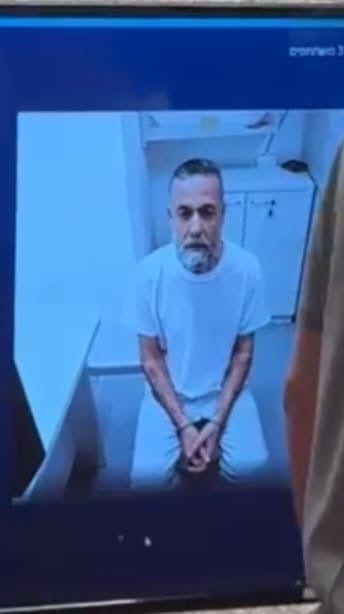 This image provided by the Physicians for Human Rights Israel (PHRI), Dr. Hussam Abu Safiya is seen on a video call from prison during an Israeli Supreme Court hearing of an appeal by his lawyers to end his detention, in Jerusalem, on June 10, 2026. (Physicians for Human Rights Israel (PHRI) via AP)