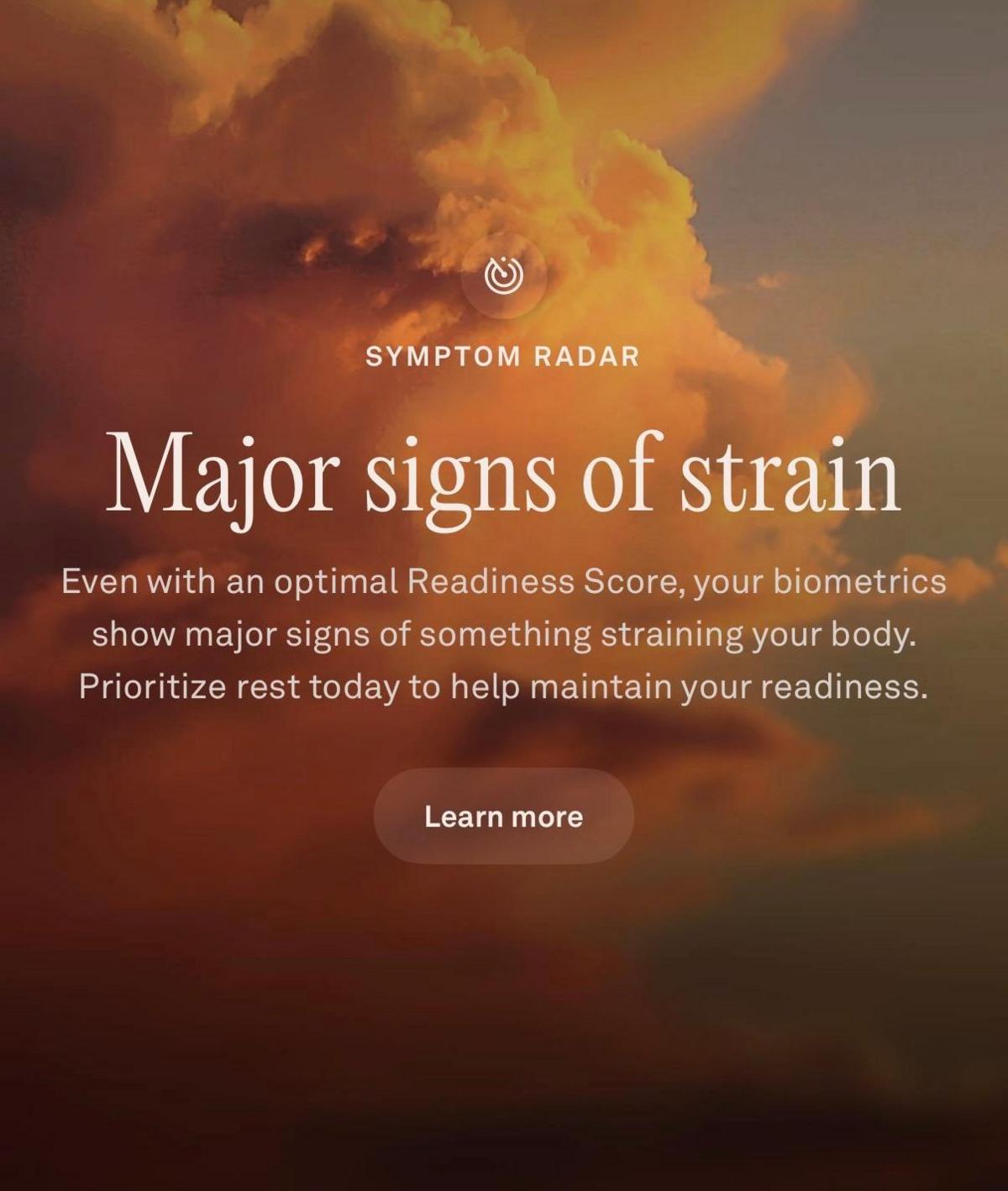 A screenshot of an Oura "Major signs" notification. In white writing against a backdrop of a large white cloud in a blue sky, it reads: Major signs of strain. Even with an optimal Readiness Score, your biometrics show major signs of something straining your body. Prioritize rest today to help maintain your readiness.