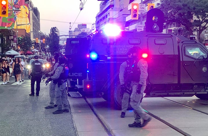 Emergency Task Force vehicles and police officers are seen on the site of a shooting in Toronto, Canada on July 11, 2026. (Photo by Jorge UZON / AFP via Getty Images)
