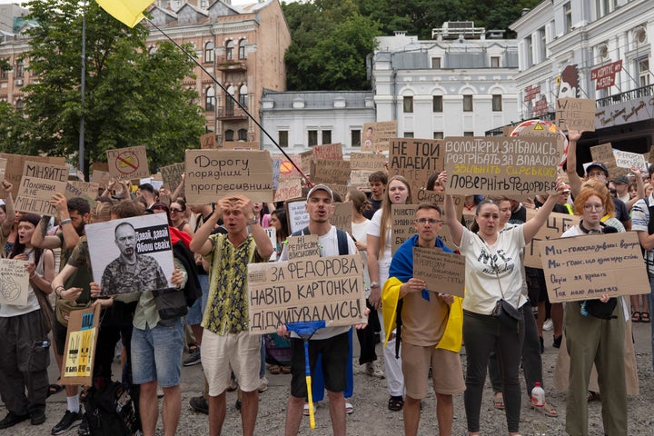 Activists shout slogans during a rally to denounce President Volodymyr Zelenskyy's decision to dismiss Defense Minister Mykhailo Fedorov after six months in the post, Kyiv, Ukraine, on July 19, 2026.
