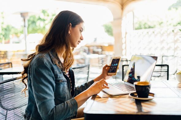 Millennials woman working in coffeeshop Millennials woman working in coffeeshop