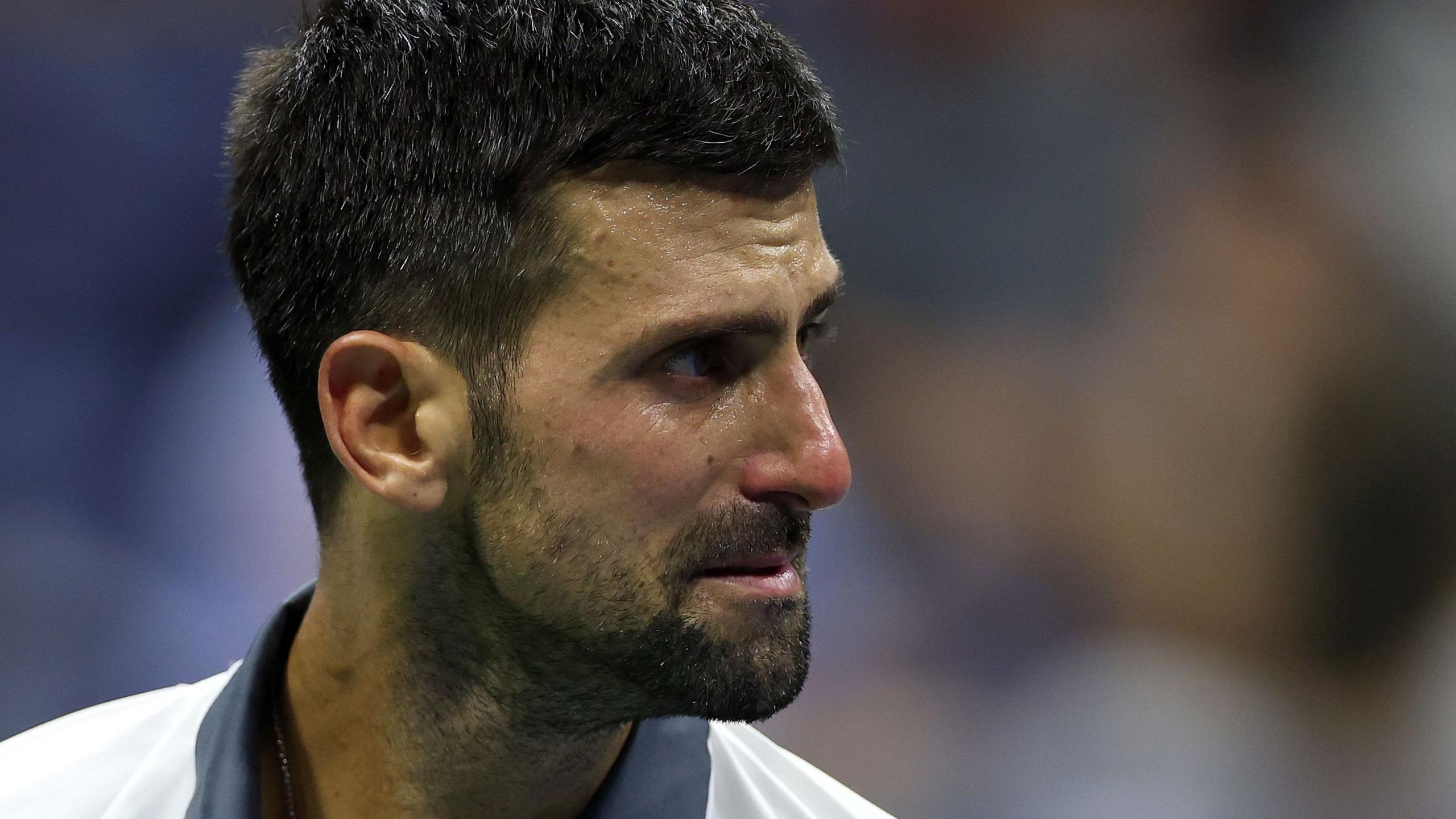 Novak Djokovic cries during his US Open defeat by Mariano Navone