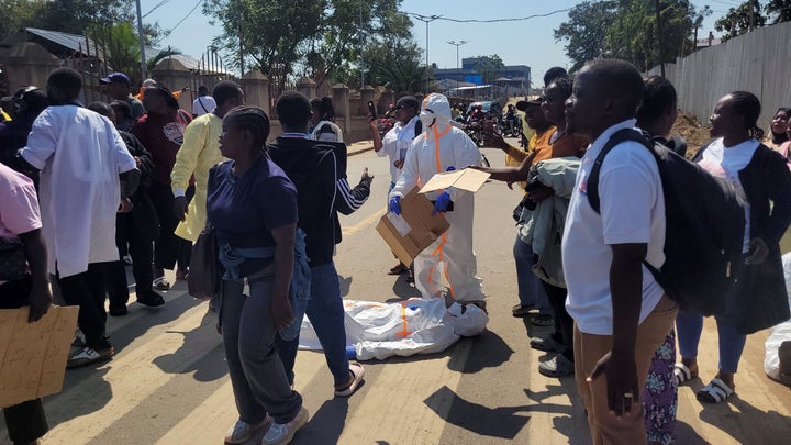 Health workers at the epicenter of Ebola outbreak protest over unpaid wages at the provincial governor's office in Ituri, eastern Congo, on Aug. 6, 2026.