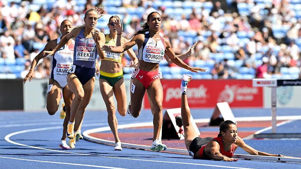 Audrey Werro of Switzerland falls to the right of Jemma Reekie of Great Britain and Northern Ireland, left, and Anaïs Bourgoin of France