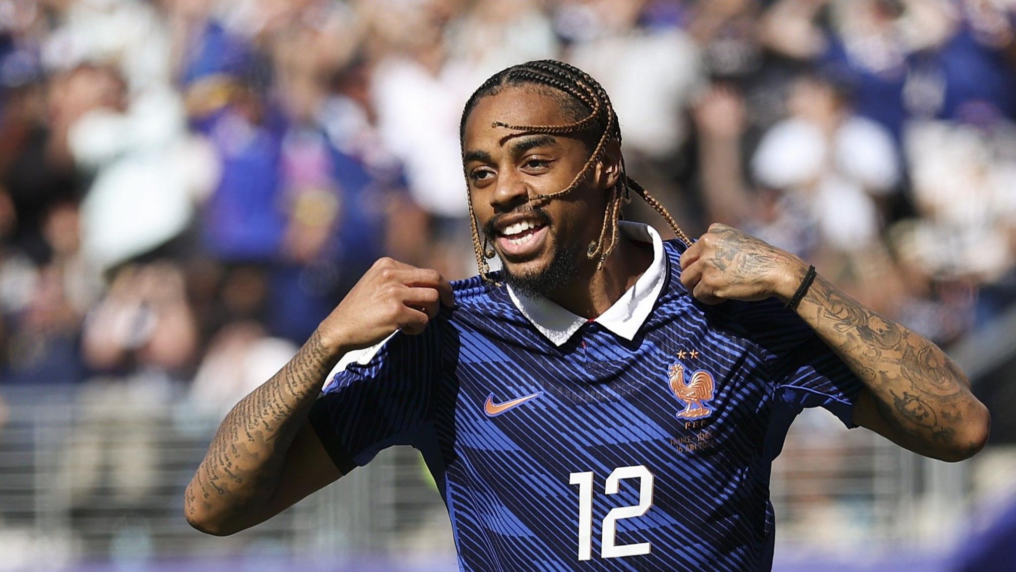 Bradley Barcola celebrates a goal for France