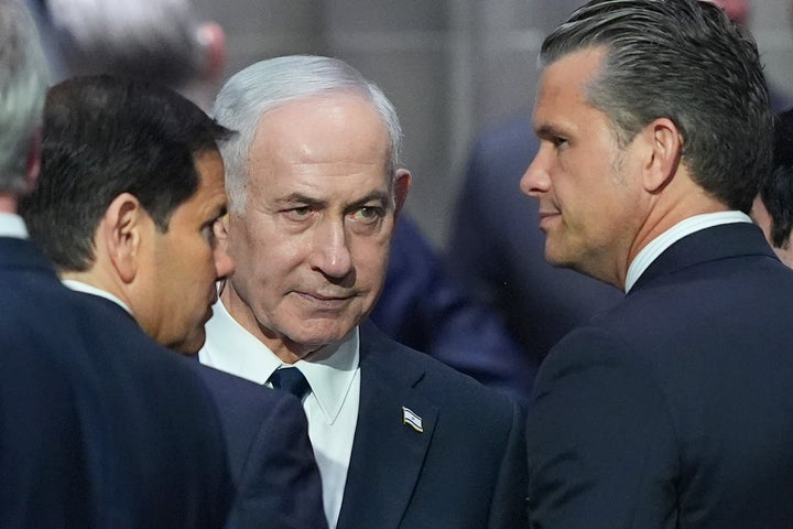 Israeli Prime Minister Benjamin Netanyahu (C) speaks to Defense Secretary Pete Hegseth (R) and Secretary of State Marco Rubio (L) before the funeral of Sen. Lindsey Graham (R-S.C.) on July 28, 2026, at the Washington National Cathedral in Washington.