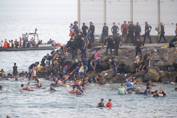 Spain will deploy its military to restore order at its border with Morocco in Ceuta after thousands of migrants streamed into the tiny Spanish territory.