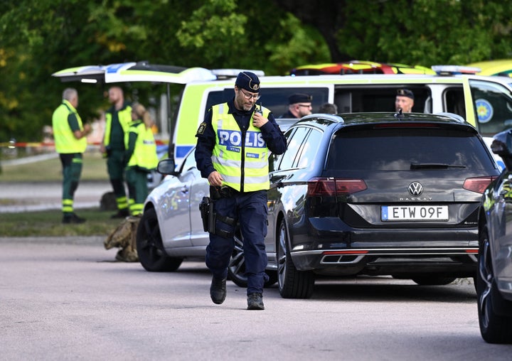 Police officers and rescue services work at the scene where an attacker with a sword wounded several people at a high school in Fagersta, central Sweden on August 21, 2026. (Photo by Fredrik SANDBERG / TT NEWS AGENCY / AFP via Getty Images)