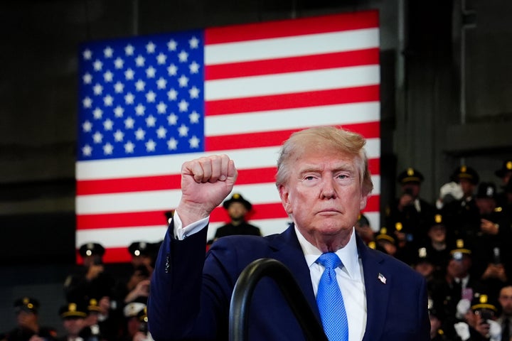 President Donald Trump gestures after speaking at the David Mack Center for Training and Intelligence, Friday, Aug. 14, 2026, in Garden City, N.Y. (AP Photo/Julia Demaree Nikhinson)