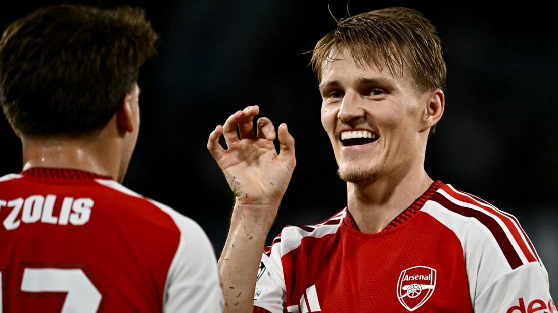 Martin Odegaard celebrates scoring the winner for Arsenal against Napoli in the Champions League