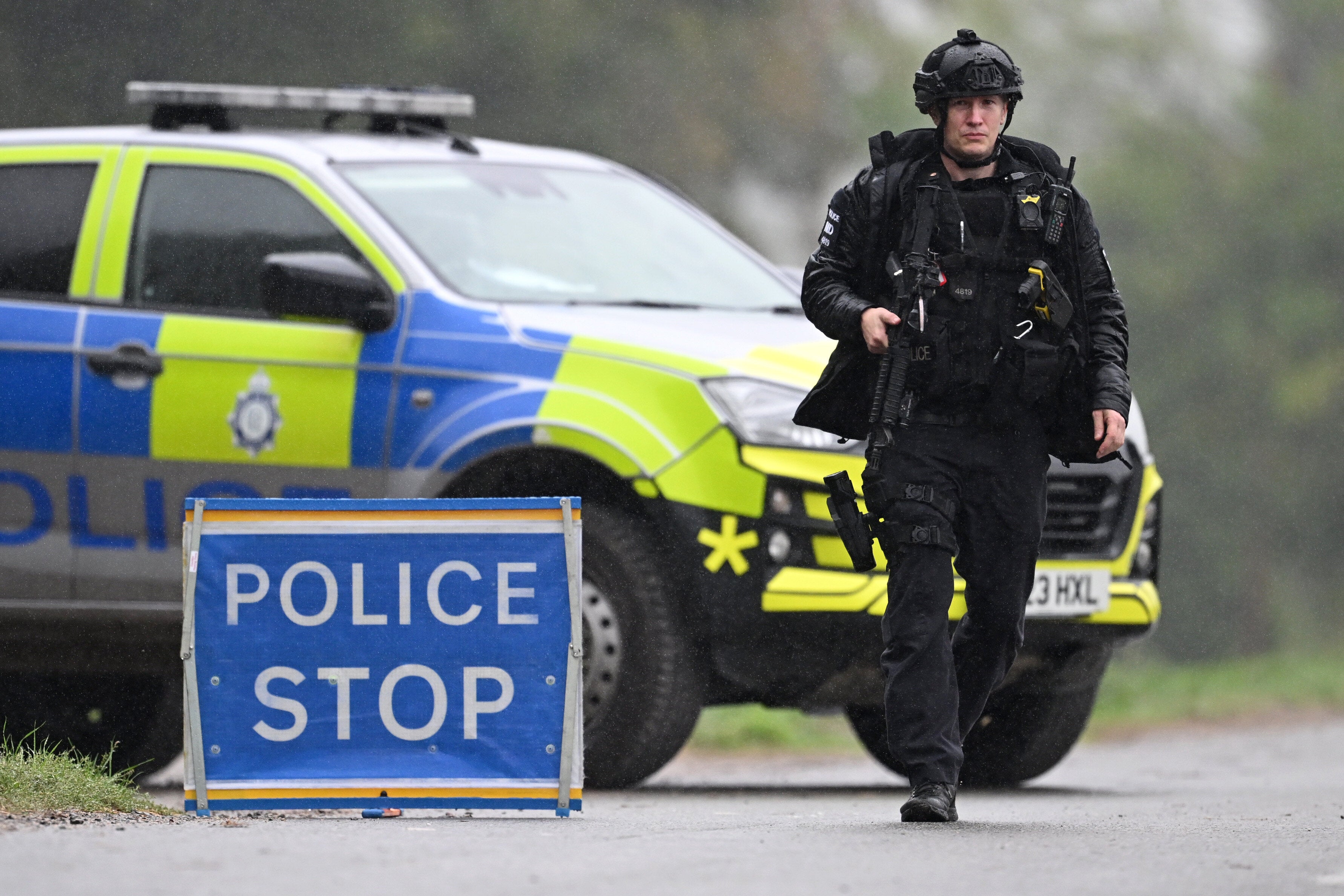 Armed police maintain road blocks and security checks around the RAF Fairford military base on Sept. 27, 2026 in Fairford, England. Police have declared a major incident after evacuating residents from their homes in Whelford, a village near the base that hosts U.S. Air Force bombers involved in the Iran conflict. Several men have been arrested on suspicion of offenses under the explosives act, and the Army's specialist explosive ordnance disposal team are examining a number of vehicles in the area.