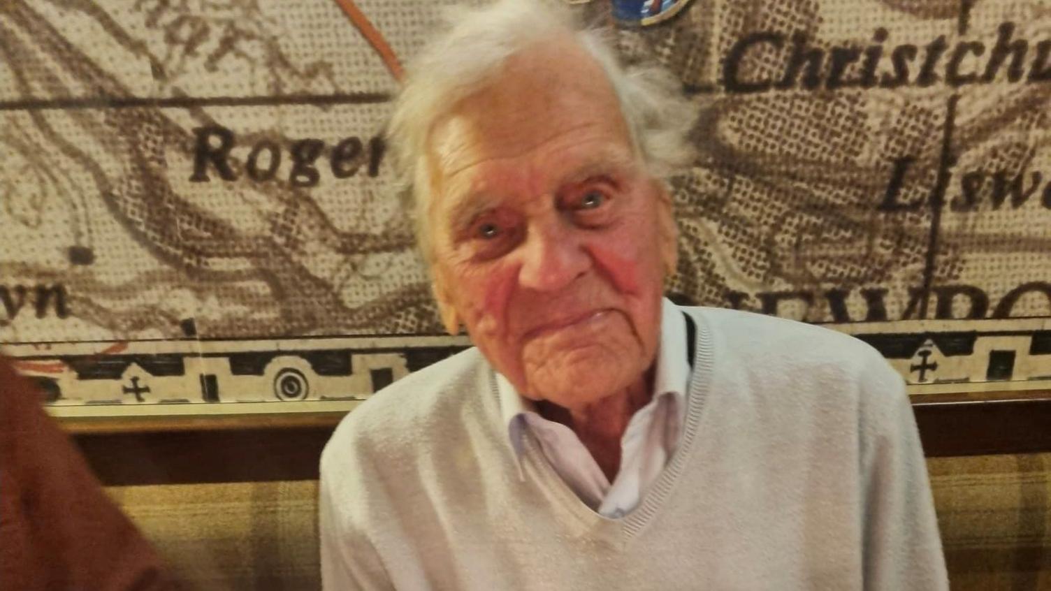 A man smiling at the camera. 