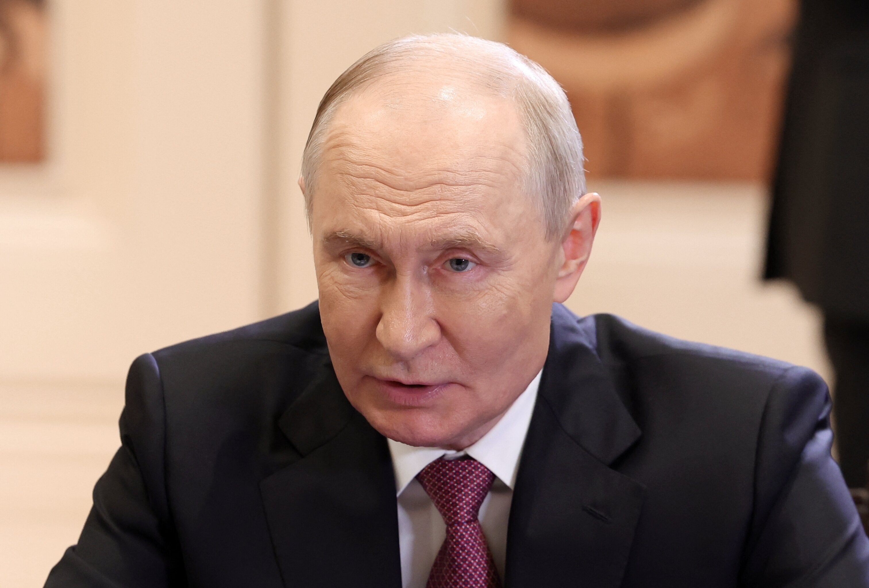 In this pool photograph distributed by the Russian state agency Sputnik, Russia's President Vladimir Putin attends a meeting with South Africa's President Cyril Ramaphosa ahead of the 18th BRICS Summit in New Delhi on September 11, 2026. (Photo by Alexander KAZAKOV / POOL / AFP via Getty Images)