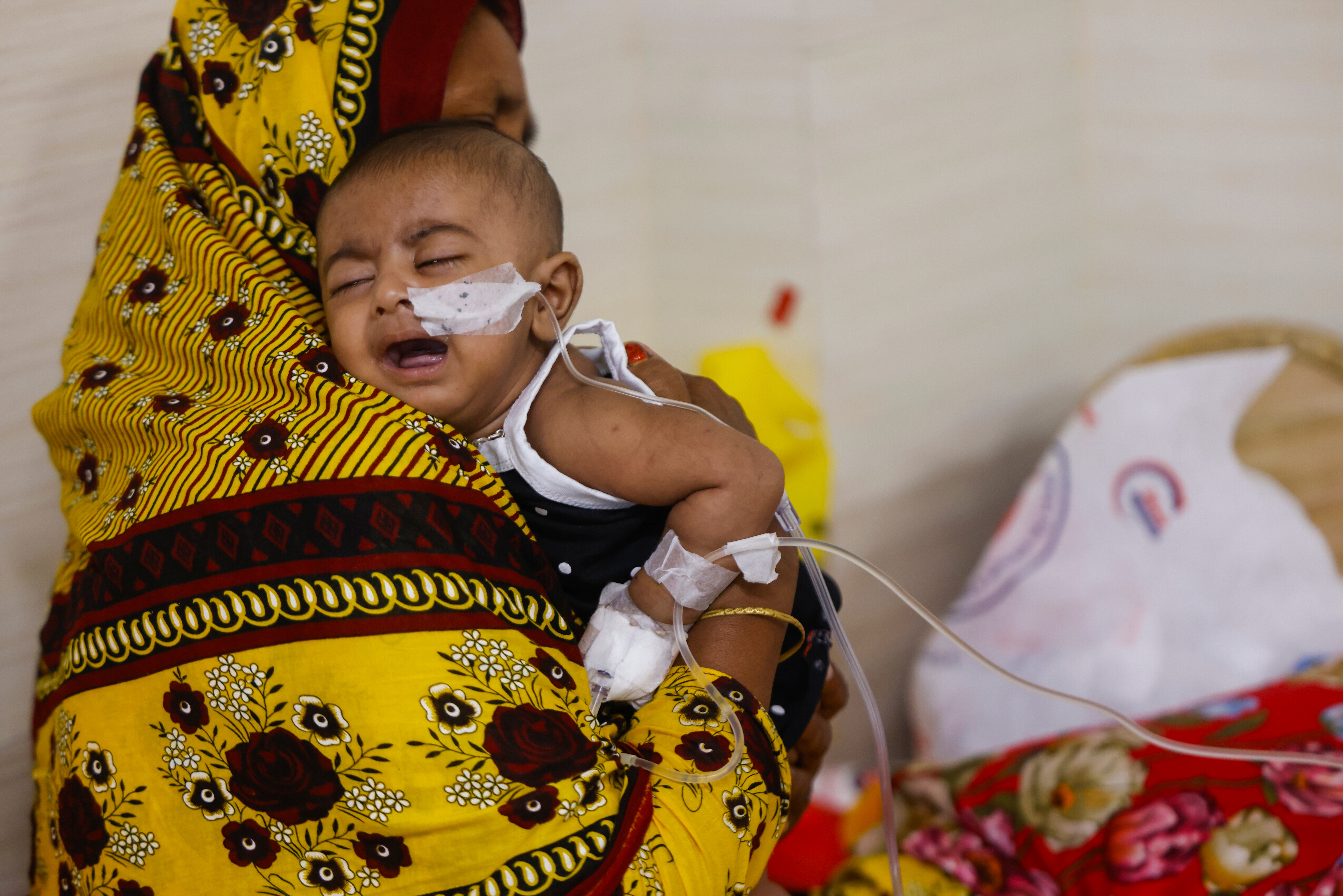 Children receive treatment for measles at Bangladesh Shishu Hospital and Institute in Dhaka, Bangladesh on Tuesday.