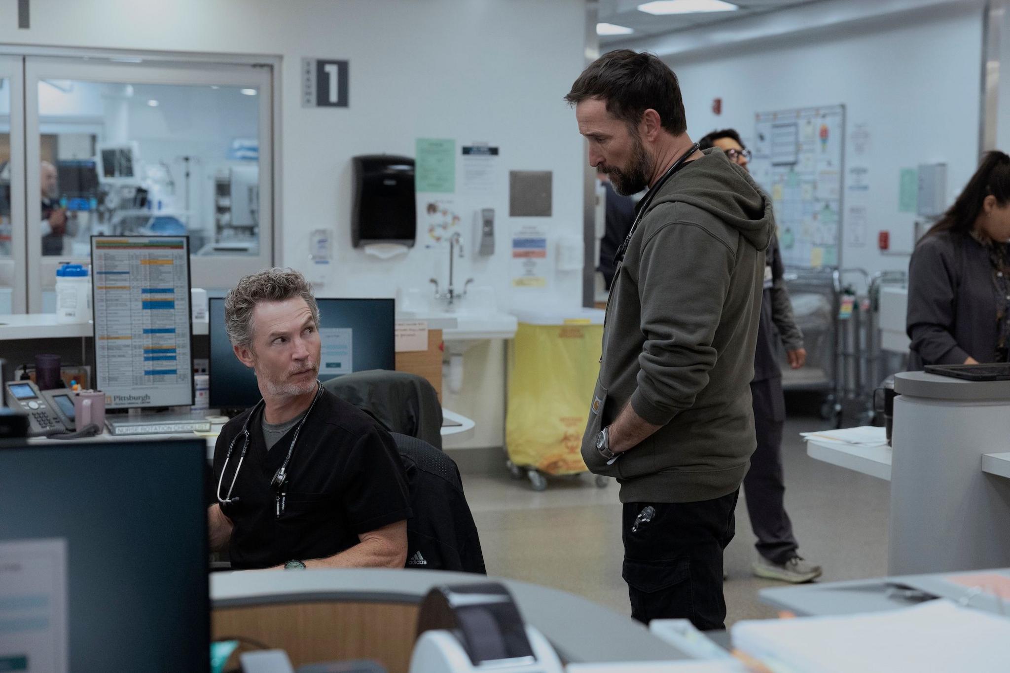 Picture of Wyle speaking with a member of medical staff