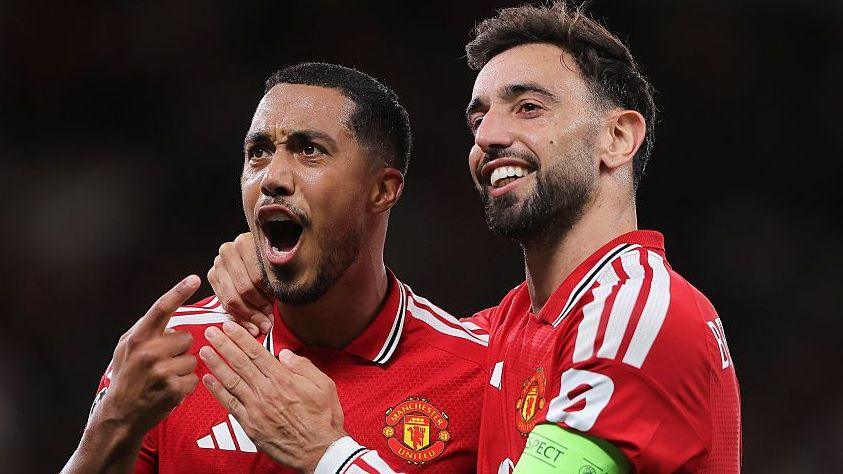 Msanchester United players celebrate