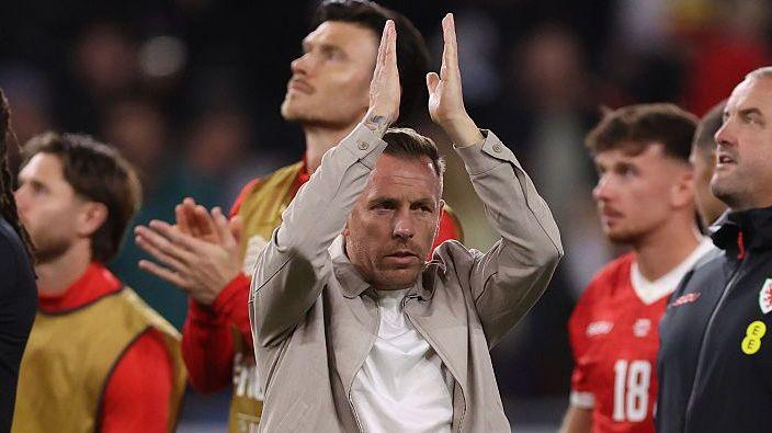 Craig Bellamy applauds