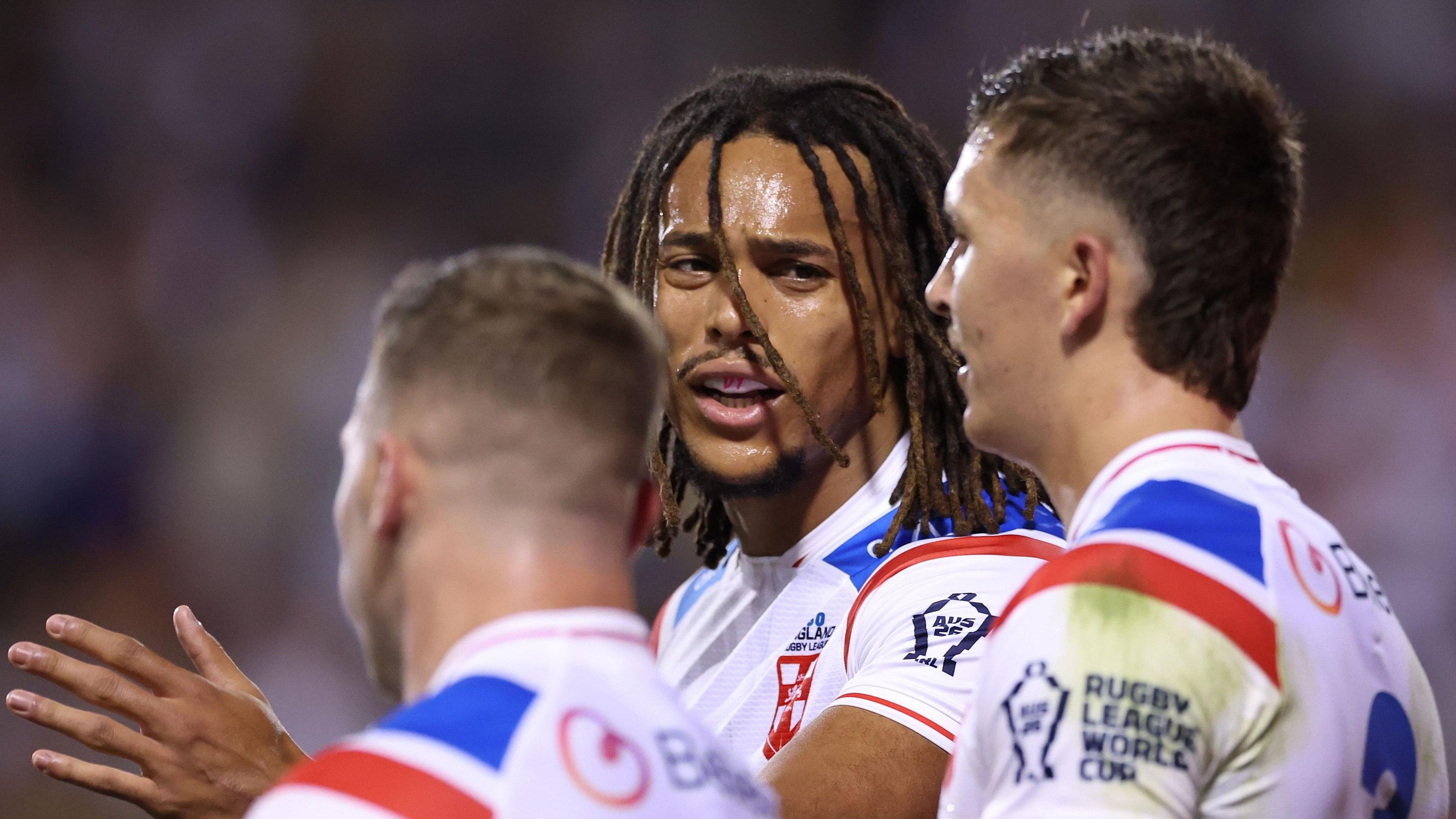 Dom Young explains a situation to his team-mates