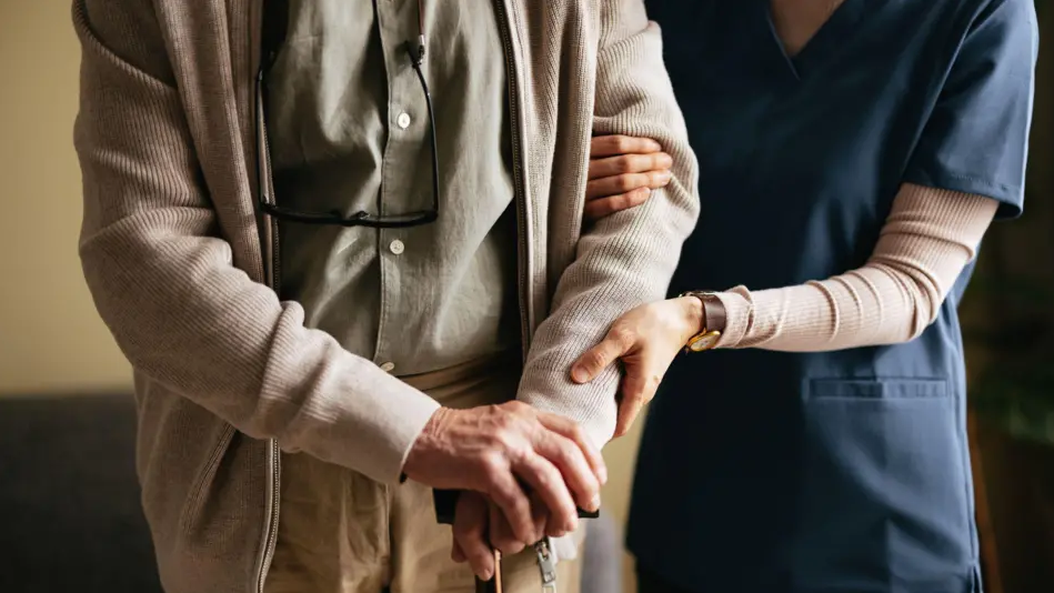 Care home resident with carer