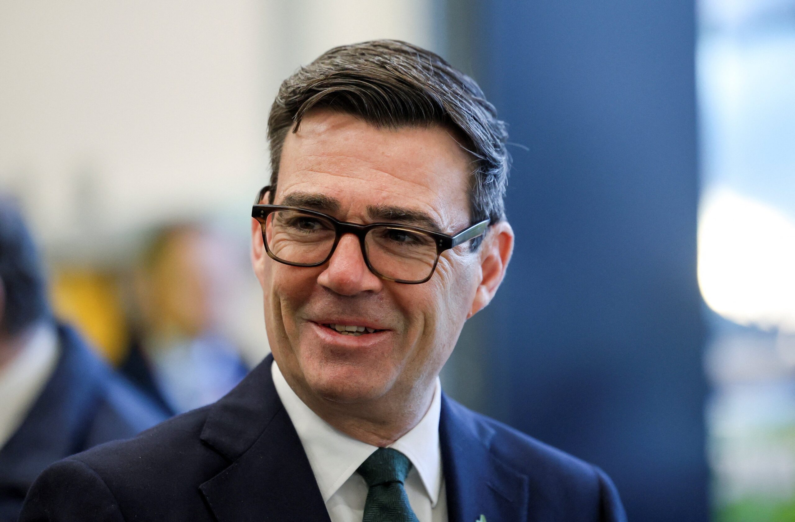 Britain's Prime Minister Andy Burnham reacts as he meets fire and rescue personnel during the inaugural Wildfires '27 Resilience Summit on strengthening community preparedness, at the National Resilience Centre of Excellence, in Aintree, England, Friday Oct. 23, 2026. (Temilade Adelaja/Pool Photo via AP)